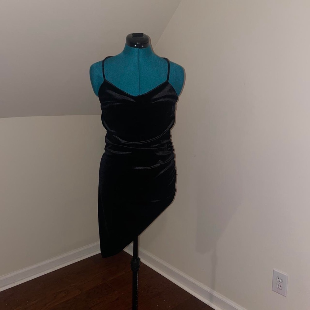 Asymmetrical strappy mini bodycon dress 

Brand: mistyrose
